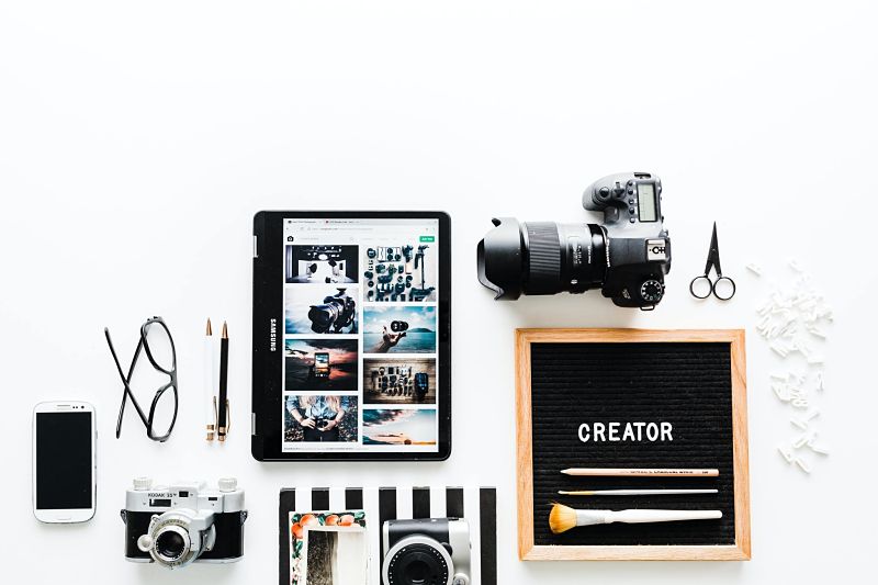 The tools of creativity laid out on a desk